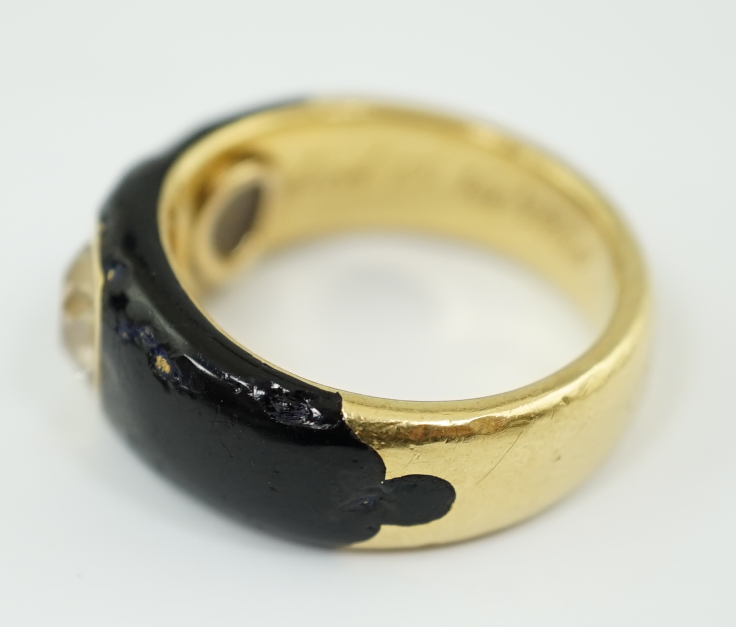 A Victorian gold, black enamel and old mine cut solitaire diamond set mourning ring